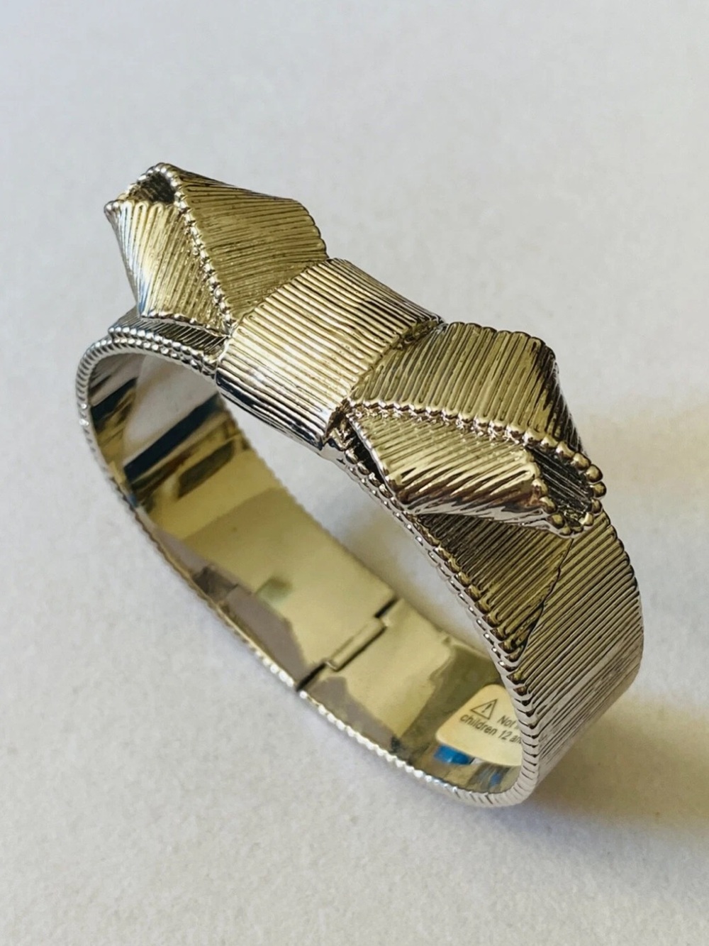 Kate Spade Silver Tone All Wrapped Up Hinged Bracelet